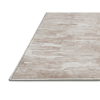 Tapis beige soyeux et moelleux