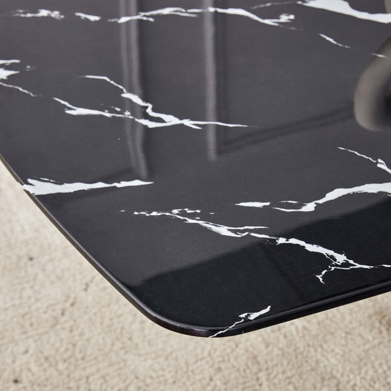 Elegant Tempered Glass Dining Table With Unique Fork Legs And Versatile Decor Compatibility