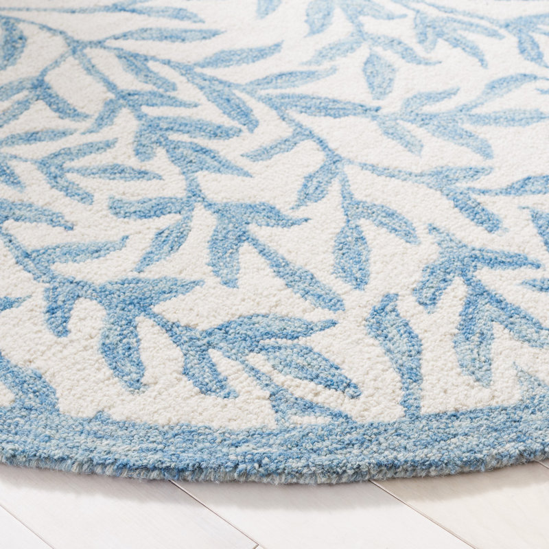 Iqarar Hand Tufted Wool/Cotton Floral Rug in Blue/Ivory, Round 6'