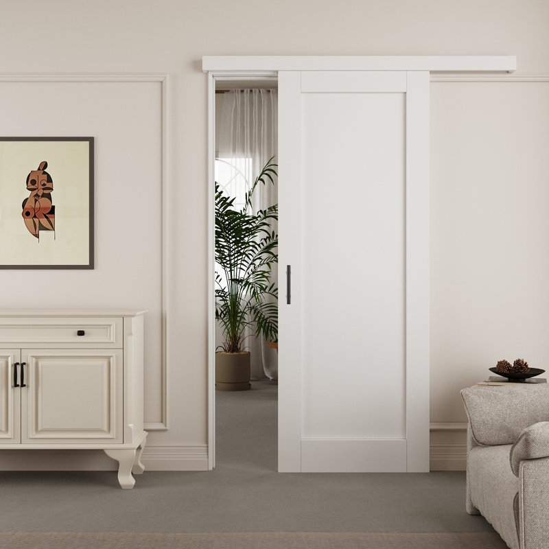 Porte de grange coulissante apprêtée avec panneau en bois manufacturé massif caché blanc avec trousse de quincaillerie d'installation et poignées noires à fermeture en douceur (aucun assemblage requis)