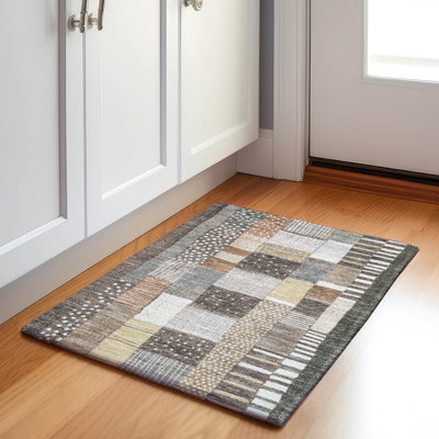 Tapis intérieur / extérieur brun lavable à la machine Xhevrie