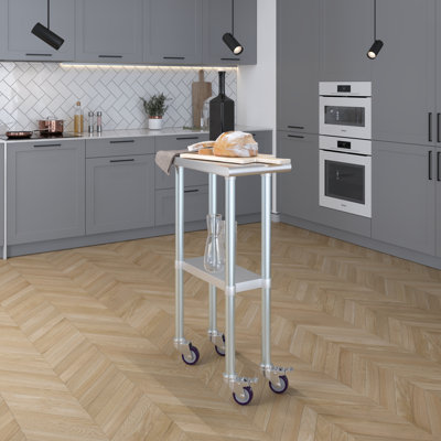 24 po X 12 po Table en acier inoxydable avec roulettes