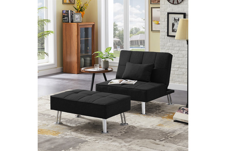 black slipper chair with matching ottoman