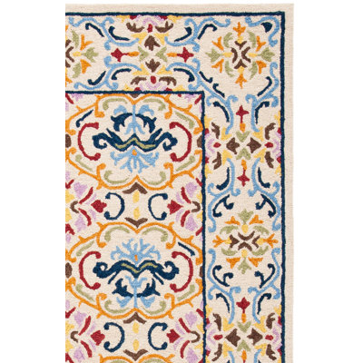 Maxcine Hand Tufted Wool/Cotton Damask Rug in Blue/Yellow/Pink