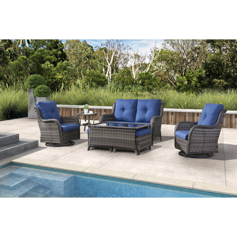Schutt 7-Piece Outdoor PE Wicker Loveseat Set with Swivel Rockers, Side Table & Tempered Glass Coffee Table - All-Weather Patio Furniture with Ottoman Storage