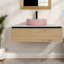 Meuble-lavabo mural moderne avec lavabo en céramique rose, élégant et écologique
