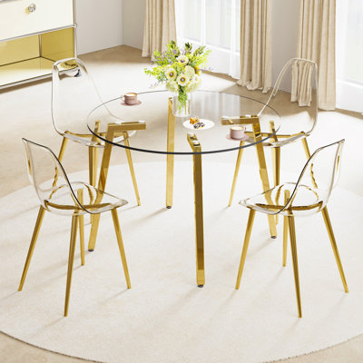 Table And Chair Set.Modern Luxurious Round Tempered Glass Dining Table Set- With Transparent Plastic Dining Chair With Gold Metal Legs.Bring A Comfortable Home Experience To The Kitchen.