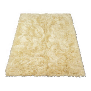 Tapis ivoire en peau de mouton