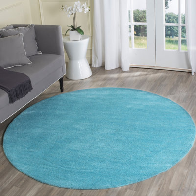Tapis en laine turquoise touffeté à la main Moreau
