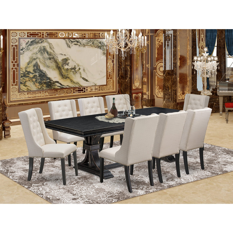 L'ensemble de salle à manger 9 pièces comprend une table rectangulaire et 8 chaises de salle à manger en tissu de lin crème avec dossier capitonné - noir sablé.