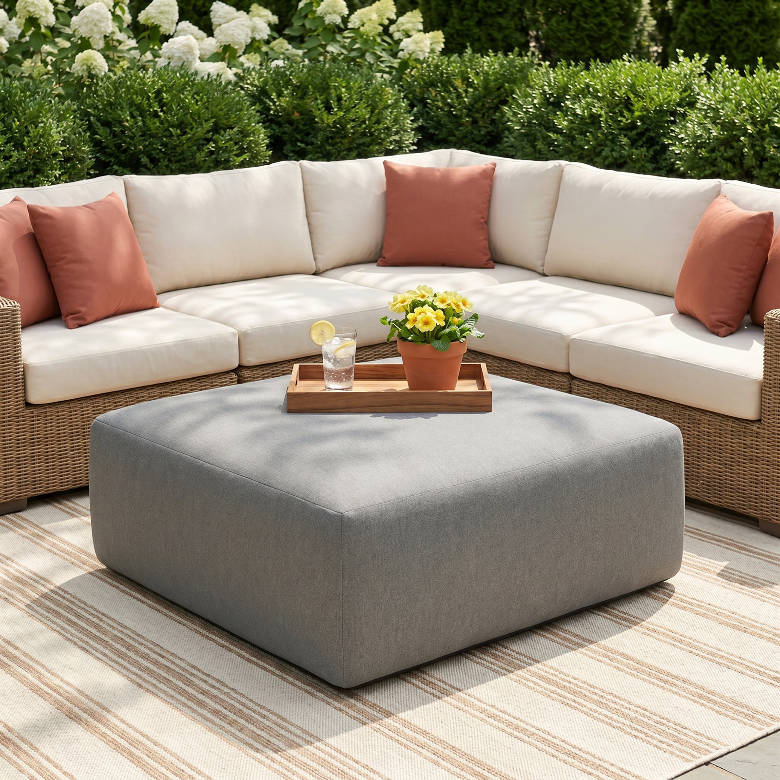 Hania Upholstered Outdoor Ottoman with Sunbrella® Cushion