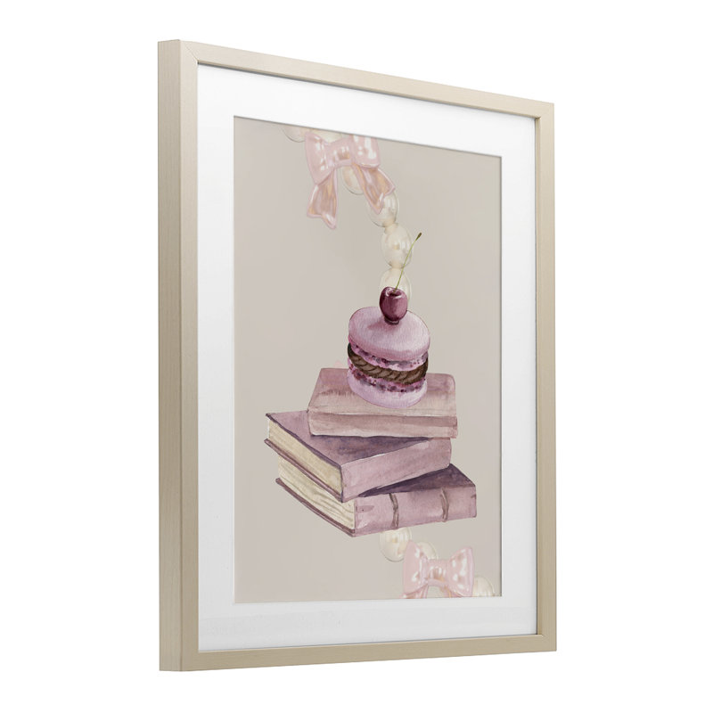 «Cherry Macaron» sur pile de livres, reproduction sous verre, conception de Jesse Keith, H 16 po x l 13 po