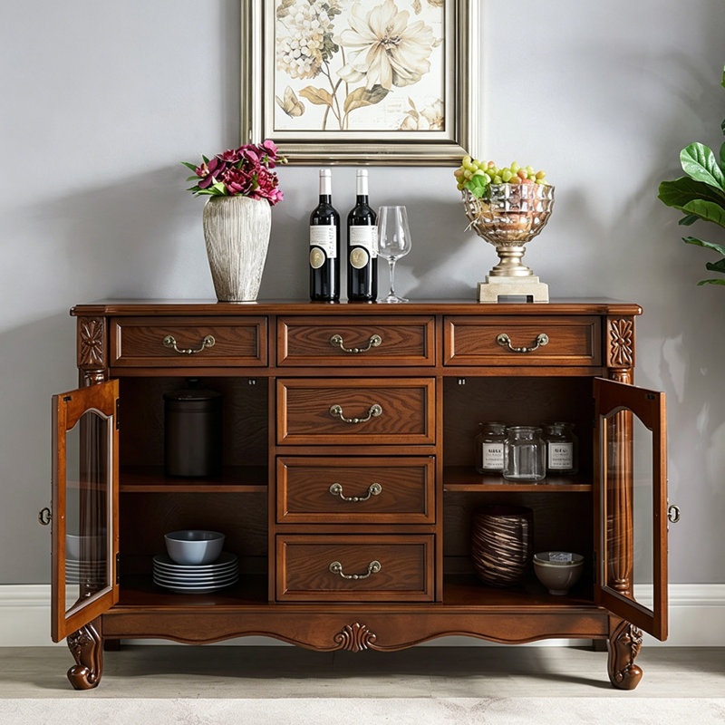 Buffet bas 43,31 "vintage en bois massif brun avec colonnes sculptées, portes en verre arquées et armoire de rangement à six tiroirs
