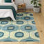 Tapis en laine bleu clair à motif abstrait Hemmer-715554722