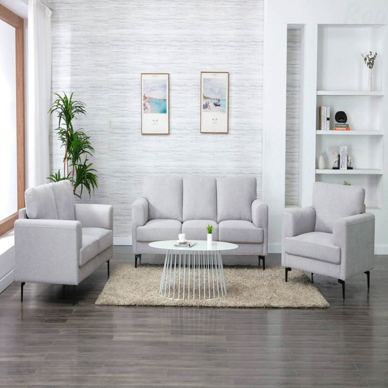 Chaise d'appoint gris clair avec pieds en métal pour les salons confortables