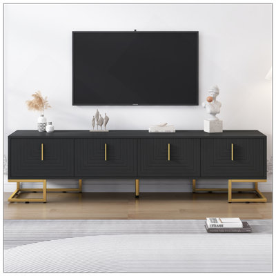 Meuble télé moderne avec pieds en métal et poignées dorées pour téléviseur de 80 po ou moins, console média avec armoires et tablettes réglables, meuble télé de luxe avec lignes géométriques pour le salon, noir