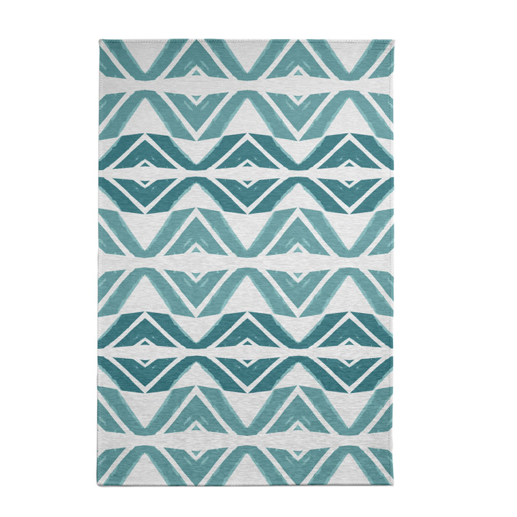 Tapis bleu sarcelle à chevrons