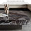 Table basse moderne carrée en faux marbre noir