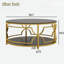 Table basse ronde avec plateau en verre trempé, structure en métal géométrique et tablette inférieure-875265713
