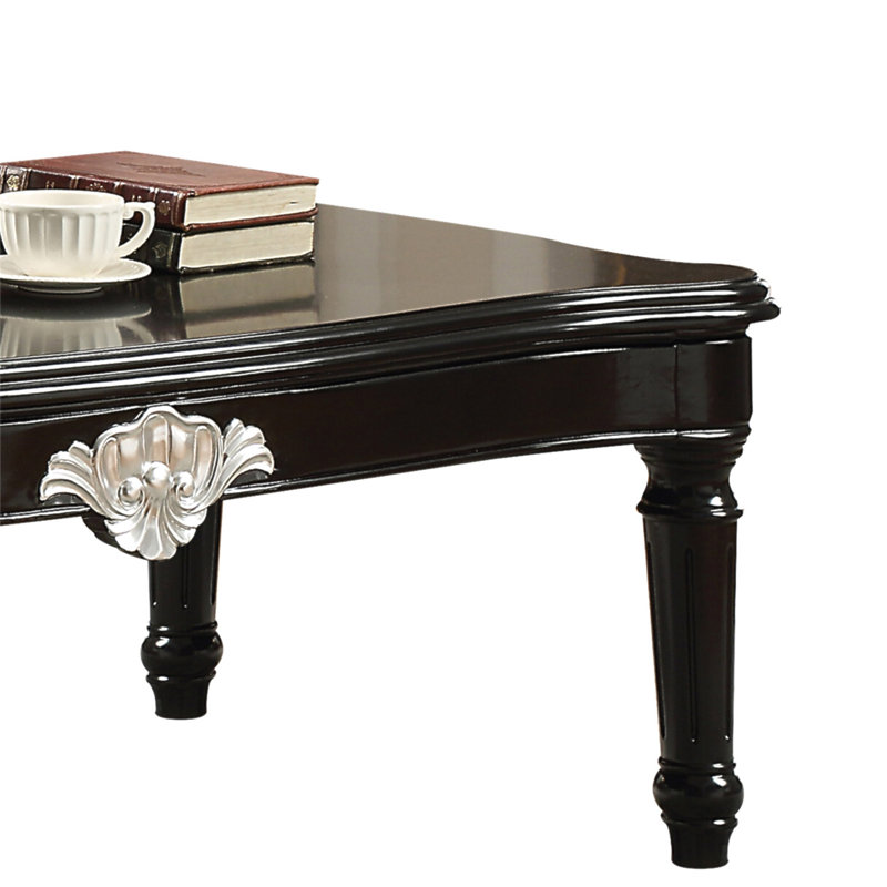 Table basse noire avec pieds tournés