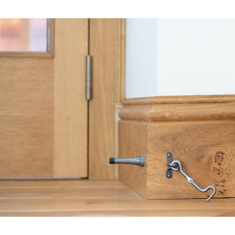 Projection Steel Baseboard Door Stop, Pewter Patina