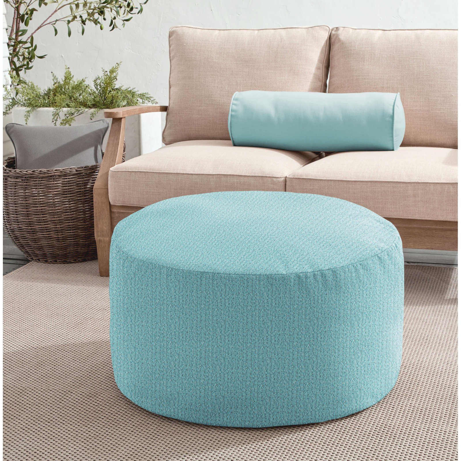 Continuous Round Upholstered Outdoor Ottoman with Sunbrella® Cushion, Light Blue