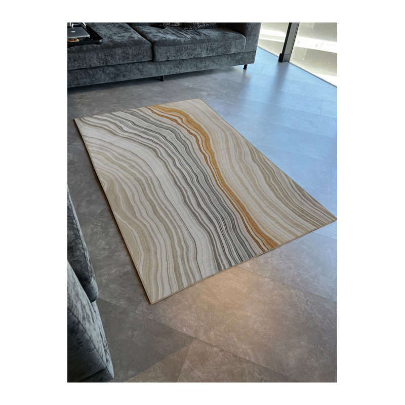 Tapis beige lavable à la machine à motif de rayures ondulées multicolores