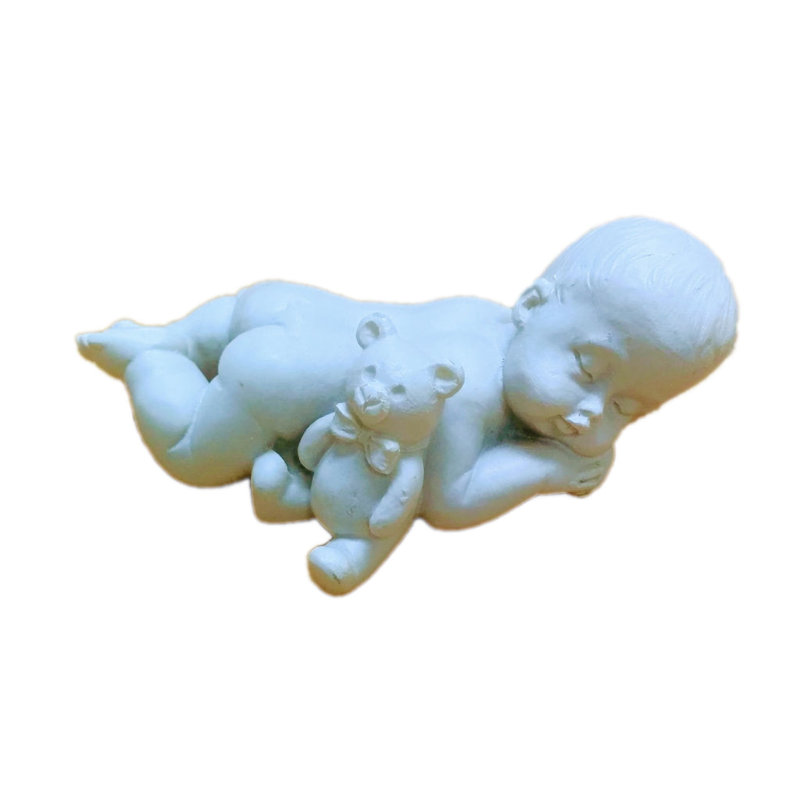 Ornements de bébé qui dort avec un ours en peluche