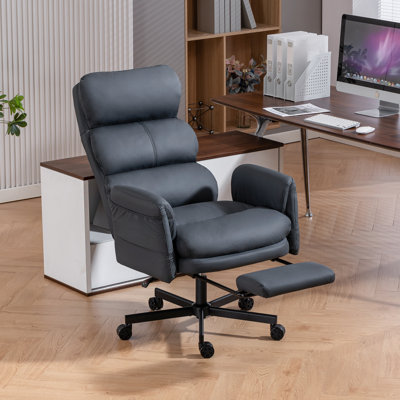 Pu Leather Cross-Legged Office Chair With Flip-Up Arms And Headrest, High-Back Ergonomic Swivel Executive Chair With Footrest And Side Pockets by George Oliver
