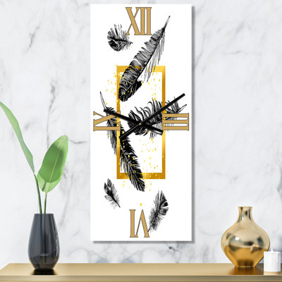Horloge murale cadre et plumes