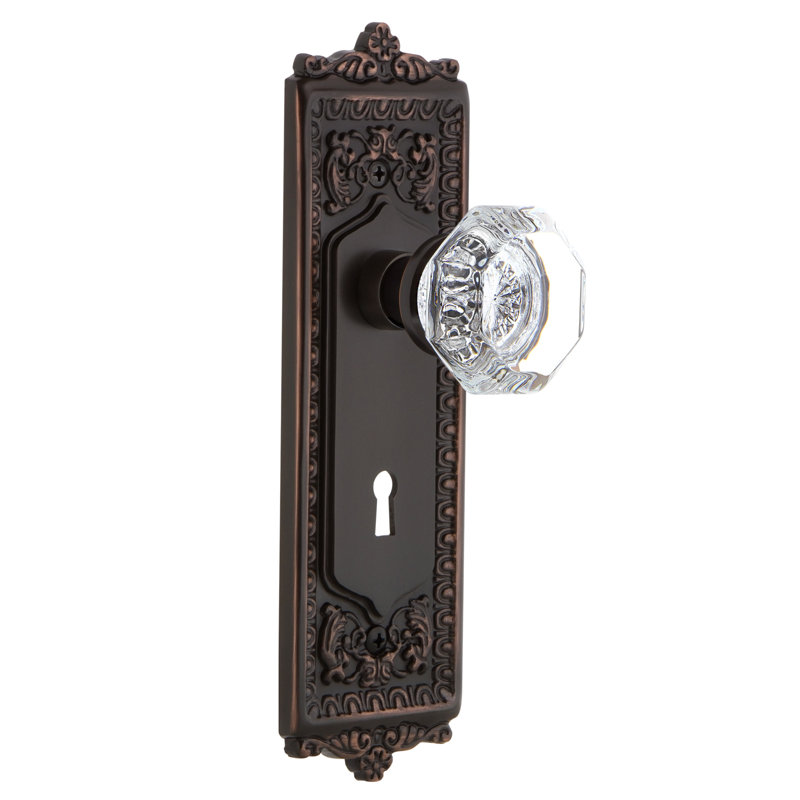 Egg & Dart Plate avec trou de serrure décoratif et bouton de porte Waldorf, Bronze intemporel
