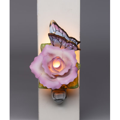 Papillon avec veilleuse paix rose