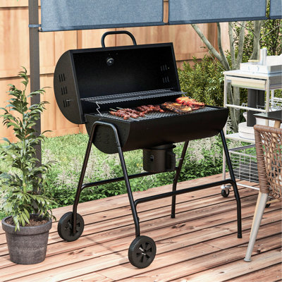 Barbecue au charbon avec 420 po Surface de cuisson et roulettes pratiques. Idéal pour les barbecues d'extérieur, les pique-niques de patio et les rassemblements dans la cour. Comprend un thermomètre intégré et un capteur de cendres pour barbecue.