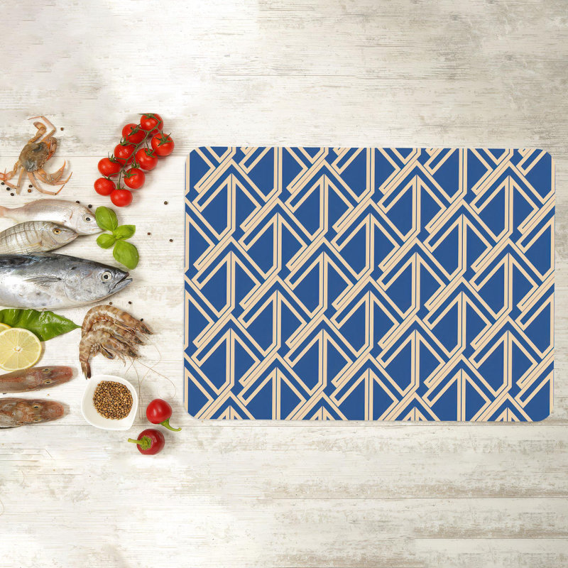 Motif géométrique bleu marine audacieux sur une planche à découper et à servir en verre moderne, parfait pour le camping ou comme cadeau élégant