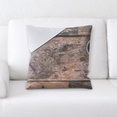 Coussin décoratif café sur table Poitras
