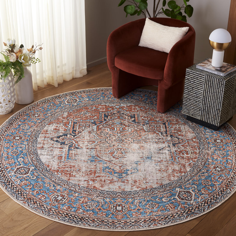 Vodeerick Orlando Felt/Velvet/Laminated Film Machine Washable Southwestern Rug in Orange/Blue, Round 6'7"
