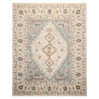 Tapis ivoire en laine touffeté à la main