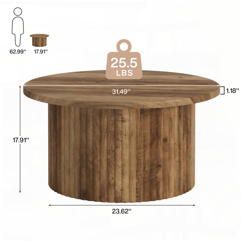 Table basse ronde avec un design minimaliste épuré et beaucoup de rangement