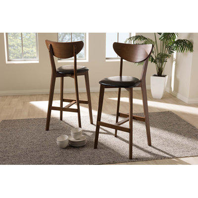 Horan Upholstered Faux Leather Counter Stool with Solid Wood Frame