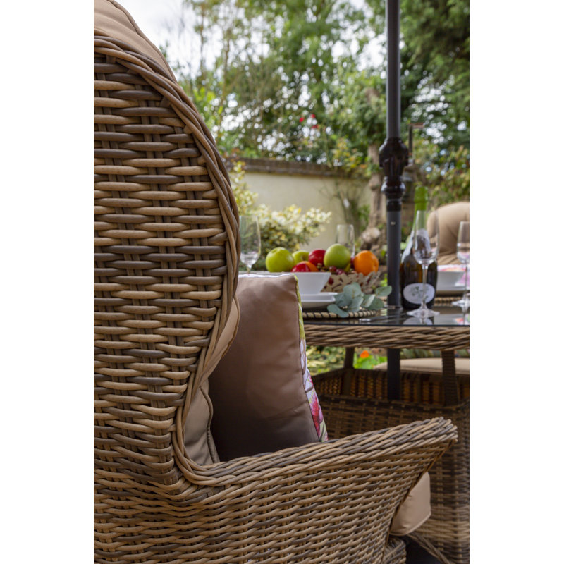Raeburn 6 - Person Patio Dining Set Oval Table with Cushions Included, Taupe, Natural