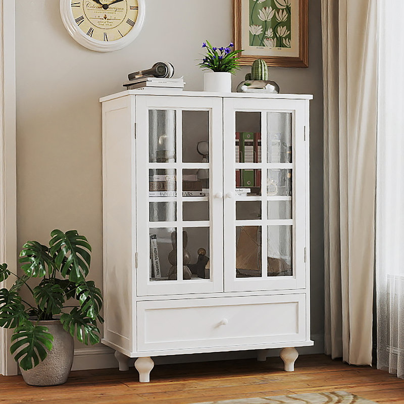 Buffet minimaliste blanc avec portes en verre et tiroir