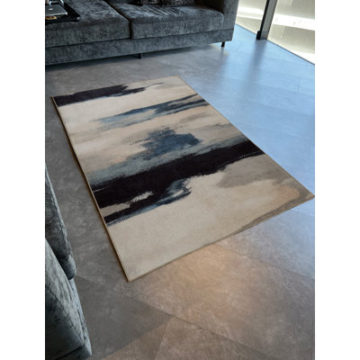 Tapis décoratif moderne beige et bleu à motifs abstraits