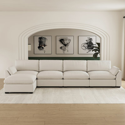 Canapé modulaire en L en velours avec repose-pieds mobile