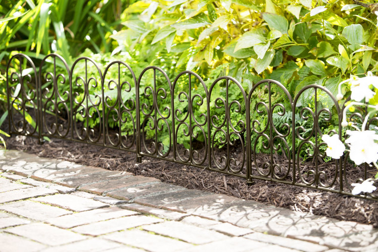 lawn edging against brick walkway