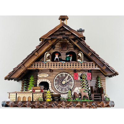  Horloge coucou à quartz avec tour de train rotatif, cloche et danseurs