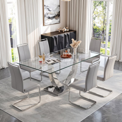 Joniya 63" D Glass Dining Set with Metal Base