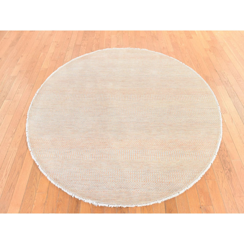 Tapis oriental rond 6 pi x 6 pi couleur pêche, ton sur ton, laine et soie, noué à la main, rond