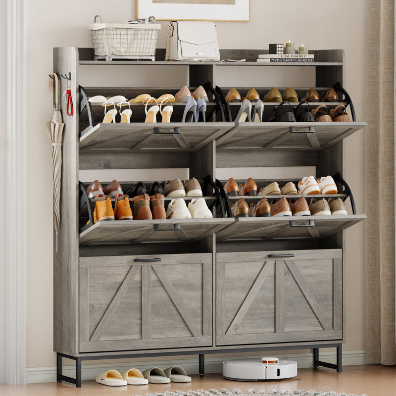 Armoire à chaussures réglable à trois niveaux de grande capacité avec tiroirs rabattables et tablettes amovibles, avec un design minimaliste moderne.