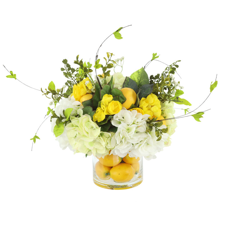 Hydrangea Florals, Kalanchoe, Berries And Lemons In A Clear Glass Vase With Realistic Looking Acrylic Water