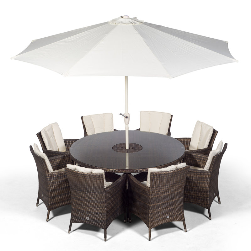 Karcher 8 - Person Wicker Patio Dining Set with Round Table , Cushions Included, Brown